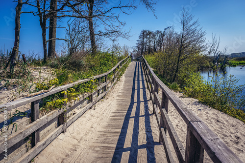 Pedestrian and bike path in Eastern Ecopark of Kolobrzeg city on the Baltic Sea coast in Poland