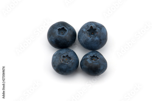 Freshly picked blueberries  isolated on white background