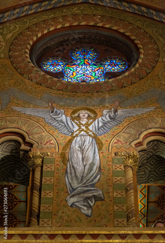 Angel and stained glass window