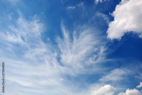 Clouds and bright blue sky background