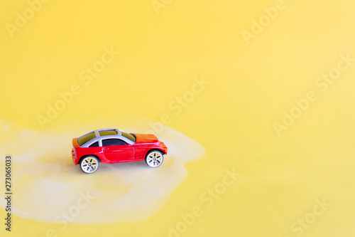 Red toy car, Summer concept..Copy space © Maryna