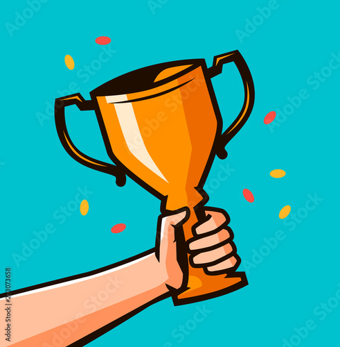 Hand holding winner's trophy award. Winning Gold cup in hands