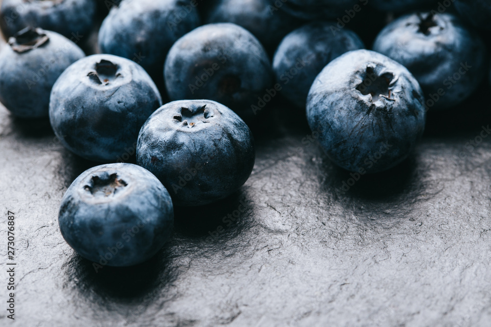 Fresh blueberry background. Texture blueberry berries close up. Vegan and vegetarian concept. Fresh blueberry background. Texture blueberry berries close up. Vegan and vegetarian concept.