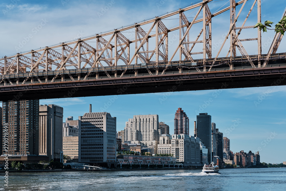 Upper East Side Manhattan and Ed Koch Queensboro Bridge on sunny day