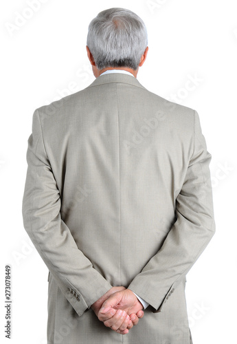 Fényképezés Closeup of a mature, businessman seen from behind with his hands clasped behind his back