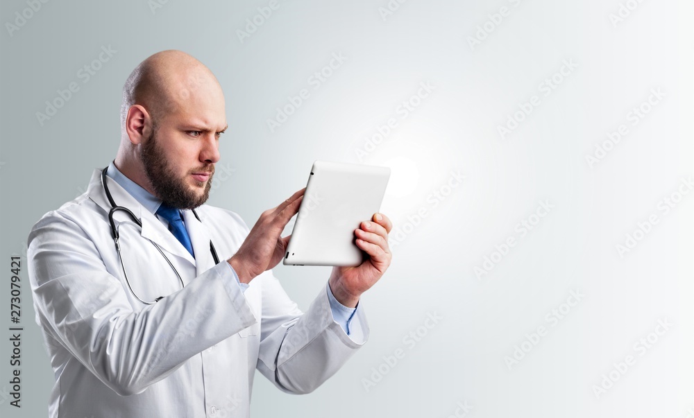 Close-up Doctor at hospital working with tablet pc Close-up Doctor at hospital working with tablet pc