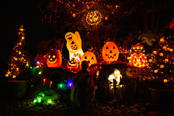 Scary halloween decorations outdoors at night close up