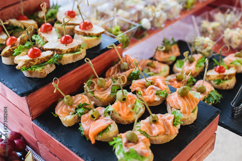 Εκτύπωση καμβά Beautifully decorated catering banquet table with assortment variety of differen