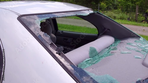 Busted out rear window of car in storm damage 4k