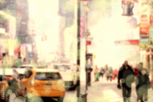 Blurry abstract background image of people walking on busy street