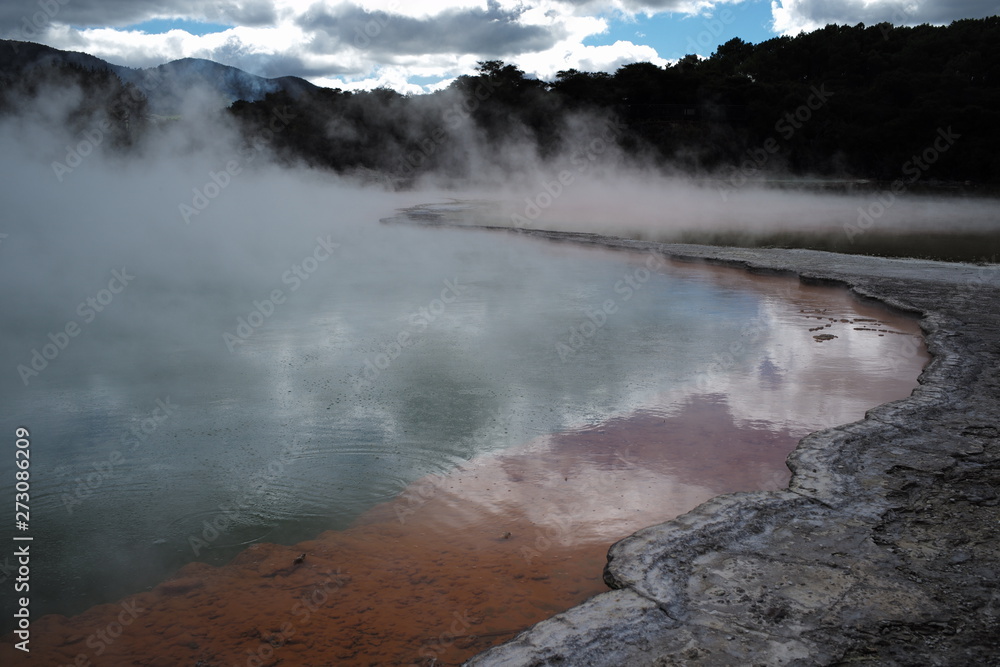 red thermal with back mountain background and blue sky