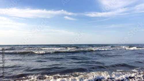 Caspian beach sea waves scene. Beside the Caspian coast on a sunny day.