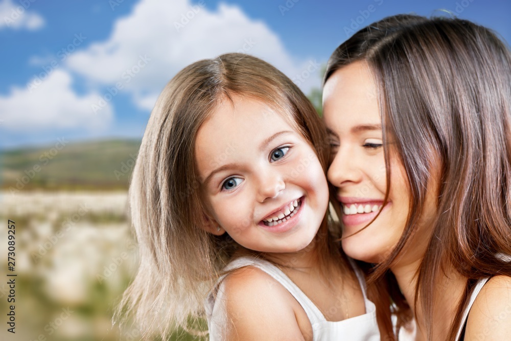Happy Mother and daughter hugging Happy Mother and daughter hugging
