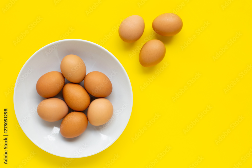 Eggs on yellow background. Eggs on yellow background.