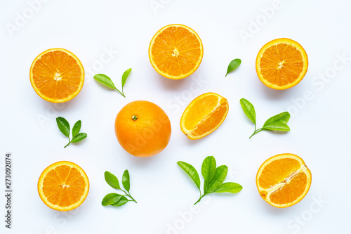 High vitamin C, Juicy and sweet. Fresh orange fruit with green leaves on white