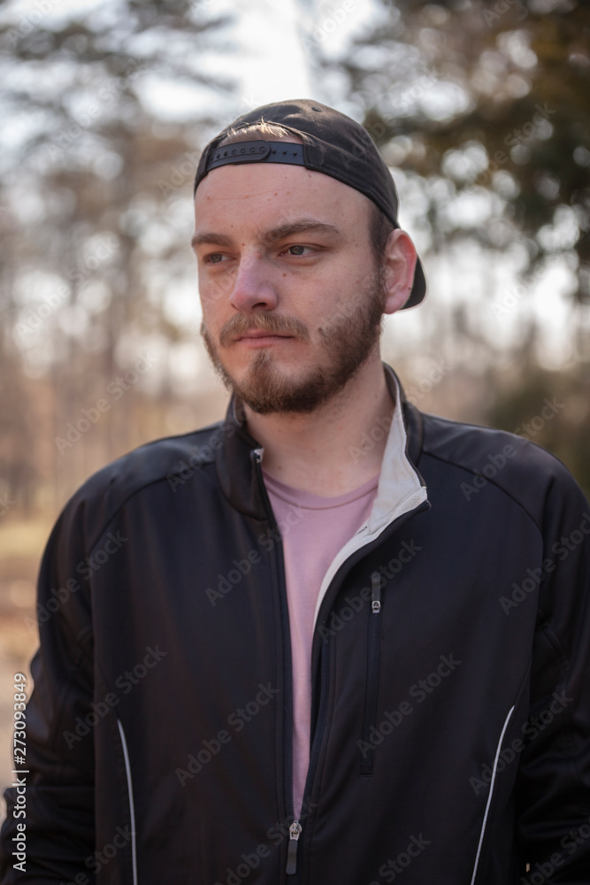 one young man, portrait outdoors, upper body. one young man, portrait outdoors, upper body.