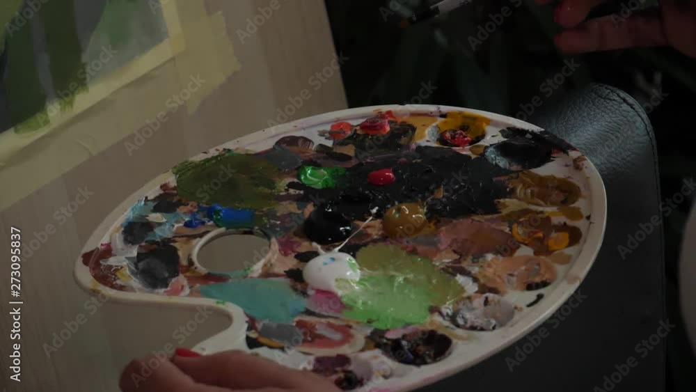 Preparing the canvas for a painting, base colour, painting with acrylic. Preparing the canvas for a painting, base colour, painting with acrylic.