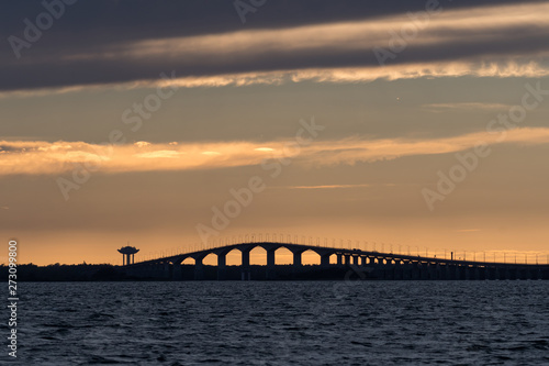 Fototapeta Naklejka Na Ścianę i Meble -  Sunset by the Oland bridge in Sweden