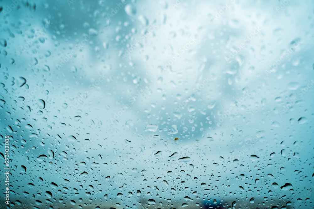 Rain drops on the windshield In the evening when heavy rain Rain drops on the windshield In the evening when heavy rain