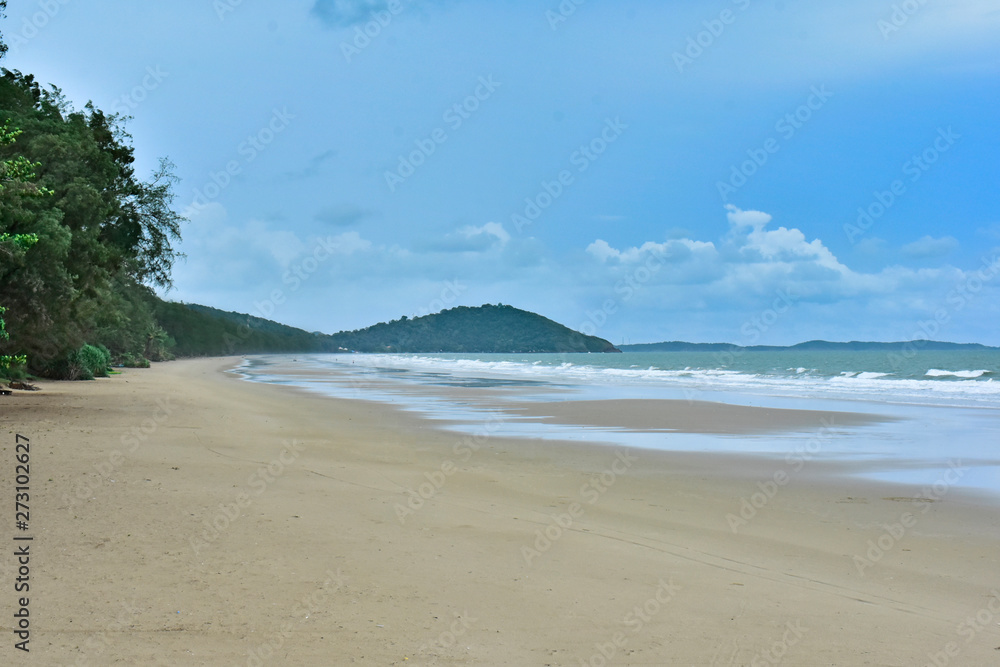 Seaside on a beautiful blue day With cool wind and waves Happy to relax Seaside on a beautiful blue day With cool wind and waves Happy to relax