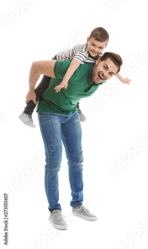 фотографія Portrait of dad playing with his son isolated on white