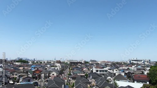 Japanese railway car window. Tokyo residential area