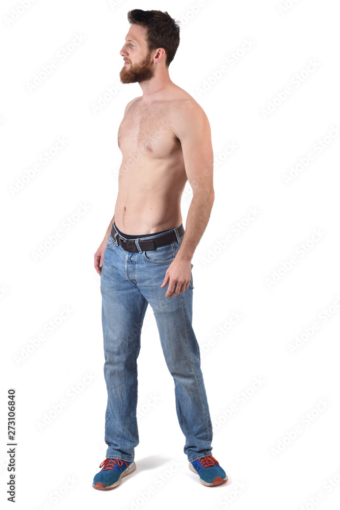 man shirtless and with blue jeans on white background man shirtless and with blue jeans on white background