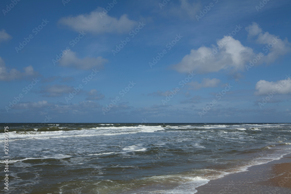 Dutch coast. Beach and dunes at Northsea Netherlands. Clouds. Dutch coast. Beach and dunes at Northsea Netherlands. Clouds.