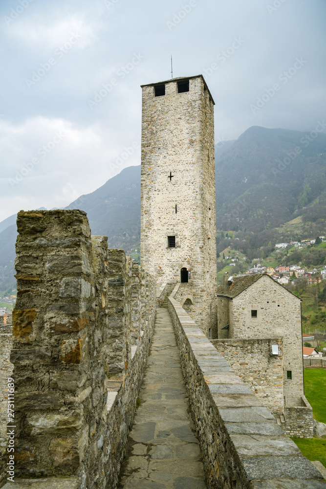 Castle walls with tall tower in Castelgrande castle in Bellinzona