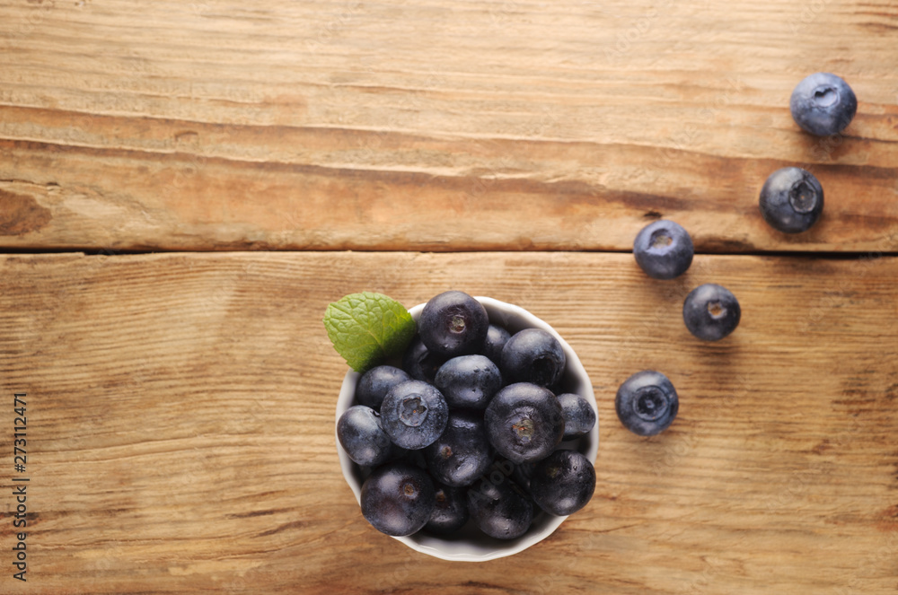 Fresh blueberries on wooden background. Fresh blueberries on wooden background.