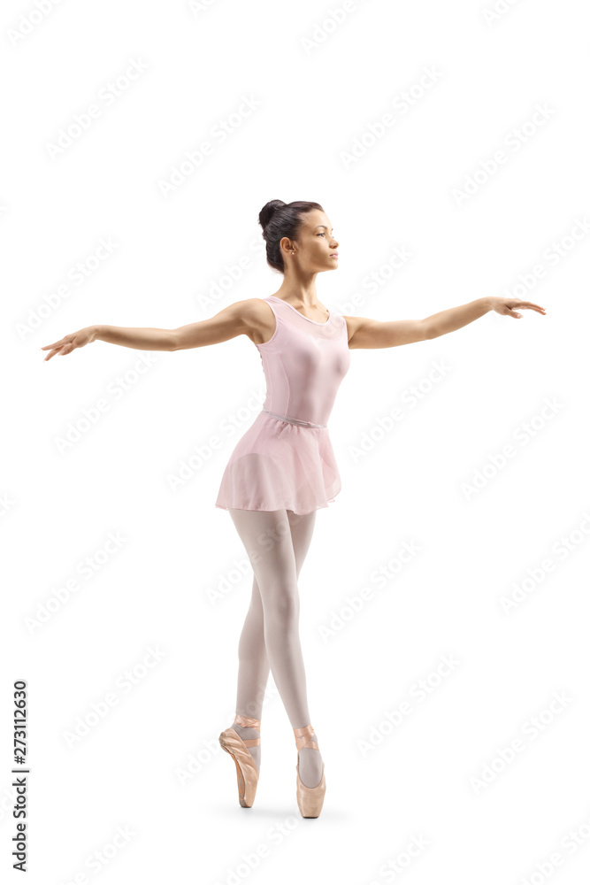 Young female ballet dancer dancing on tiptoes