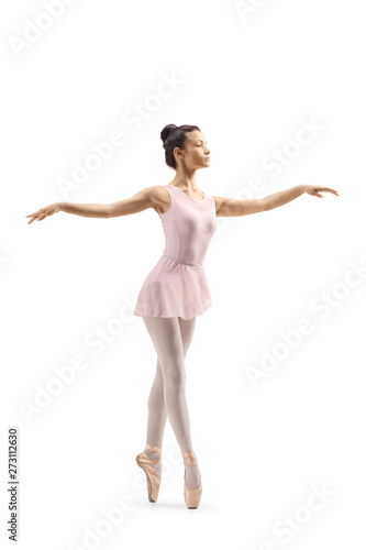 Young female ballet dancer dancing on tiptoes