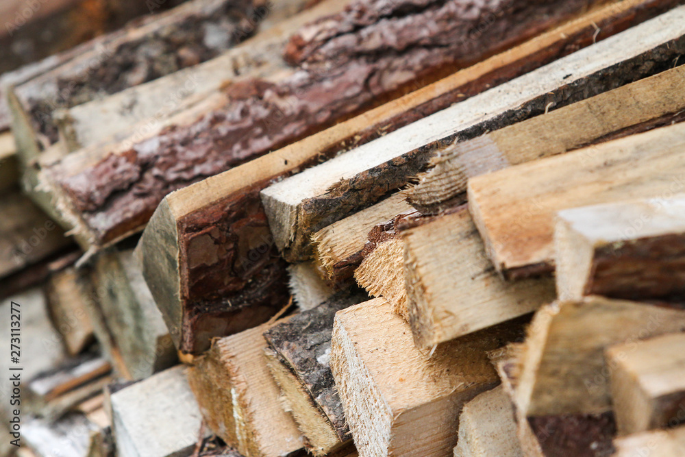Beautiful countryside view of timber firewood stacked in a big stack near home in a countryside village home. Beautiful countryside view of timber firewood stacked in a big stack near home in a countryside village home.