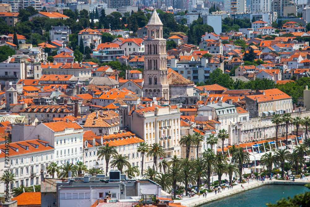 Old town of Split in Dalmatia, Croatia. Panoramic view of city center, palace of Roman emperor Diocletianus and cathedral. Popular tourist destination in Europe.