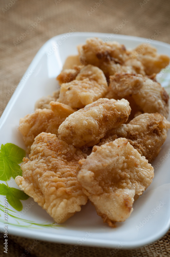 Malaysian style battered and deep fried dory fish cubes. Malaysian style battered and deep fried dory fish cubes.
