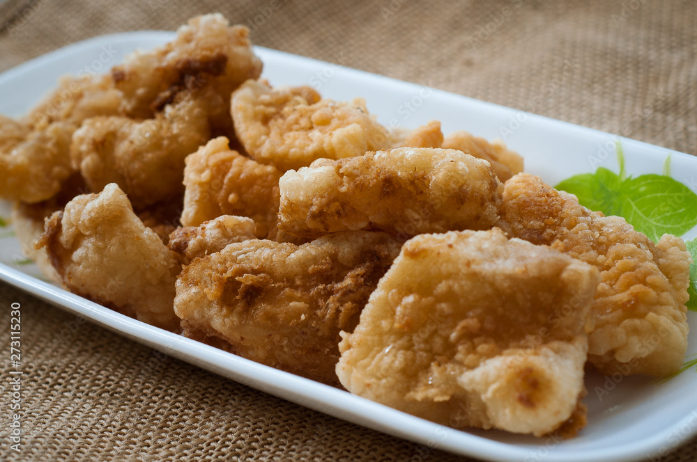 Malaysian style battered and deep fried dory fish cubes. Malaysian style battered and deep fried dory fish cubes.