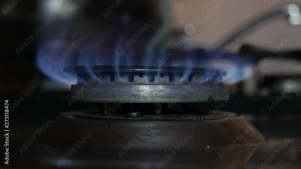 Turning on a gas stove for cooking. Gas problem. Gas crisis.