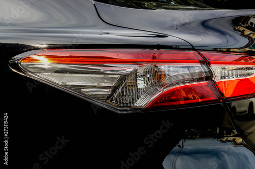 close up modern design rear LED light of sport car in automobile industry