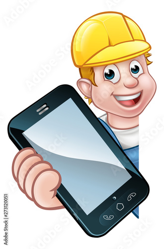 A handyman or mechanic holding a phone with copyspace