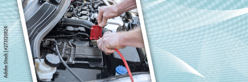 Hands of car mechanic using car battery jumper cable. panoramic banner