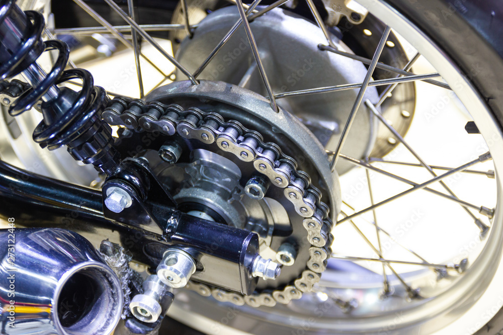 Detail of a motorcycle rear chain, concept new design technology Detail of a motorcycle rear chain, concept new design technology