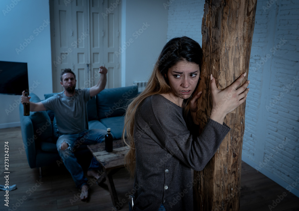Woman victim of domestic violence and abuse. Husband intimidating his