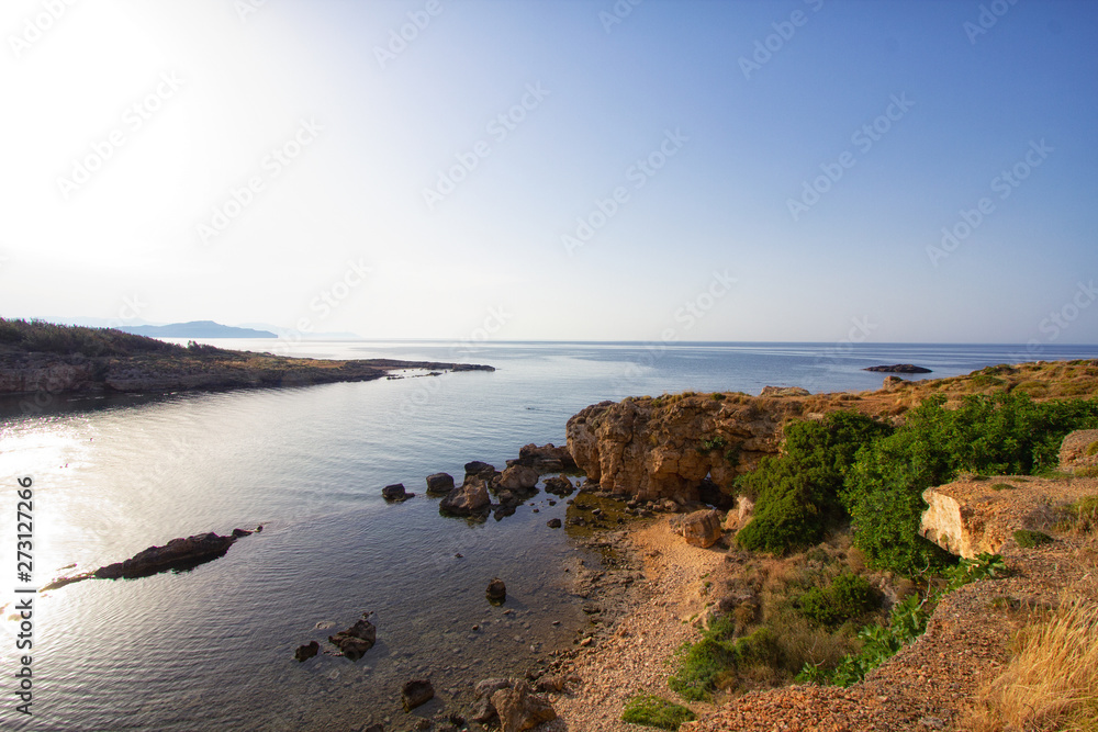 coast of Crete, Greece with beautiful rocky and sandy beaches. travel background