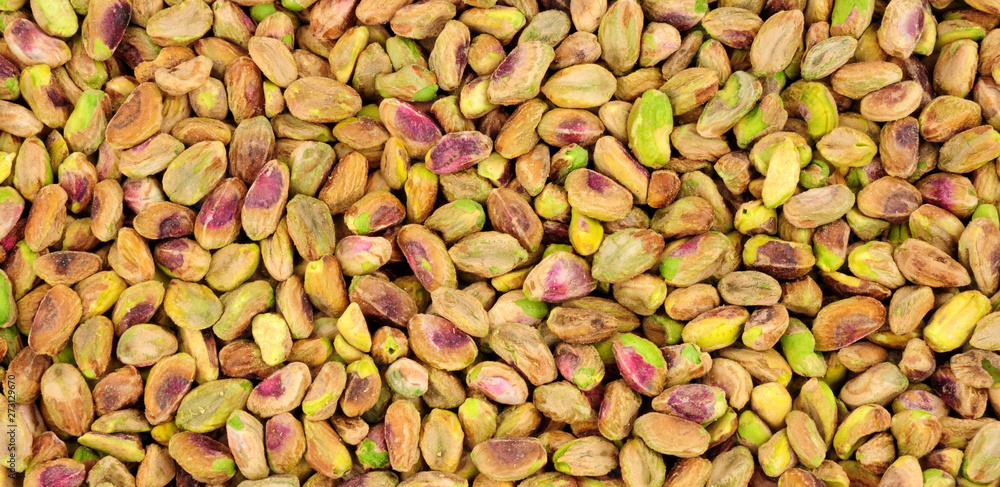 fresh raw shelled pistachio nut kernel background