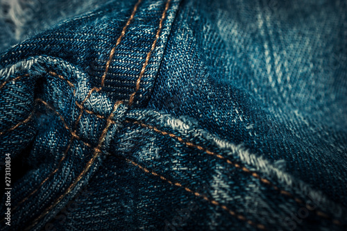 Closeup of Denim Jeans Crotch Point Double Stitched Seams. Denim Stitching Detail.