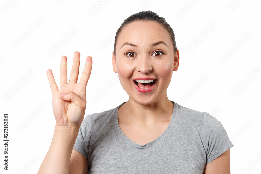 Beauty holding up four fingers, portrait Beauty holding up four fingers, portrait