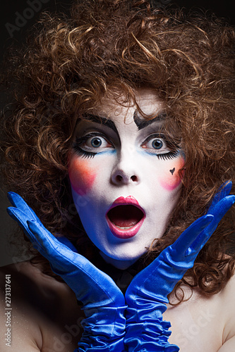 Woman mime with theatrical makeup. Close-up shot