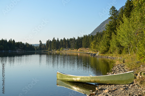 lakeside canoe on a beautiful day in canada