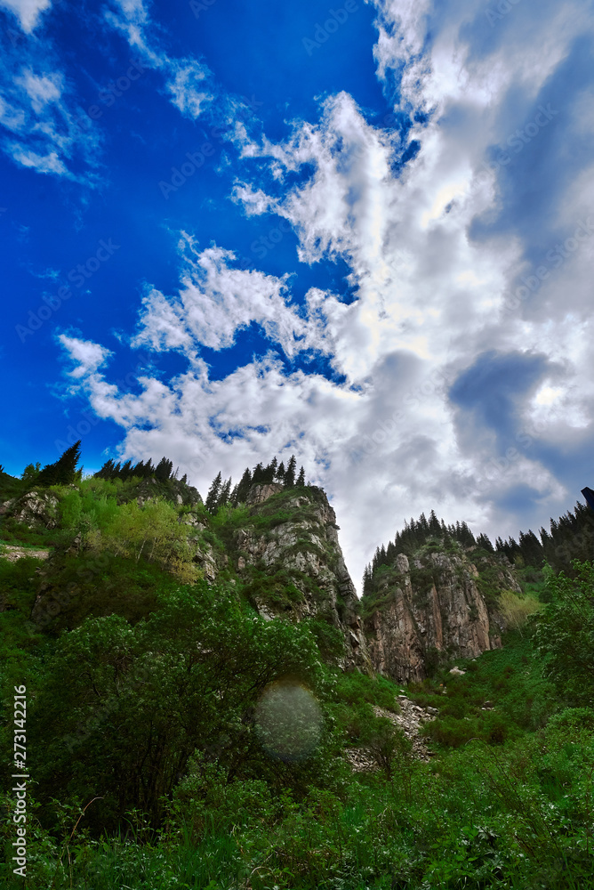 butakovsky waterfall with sky and cloud