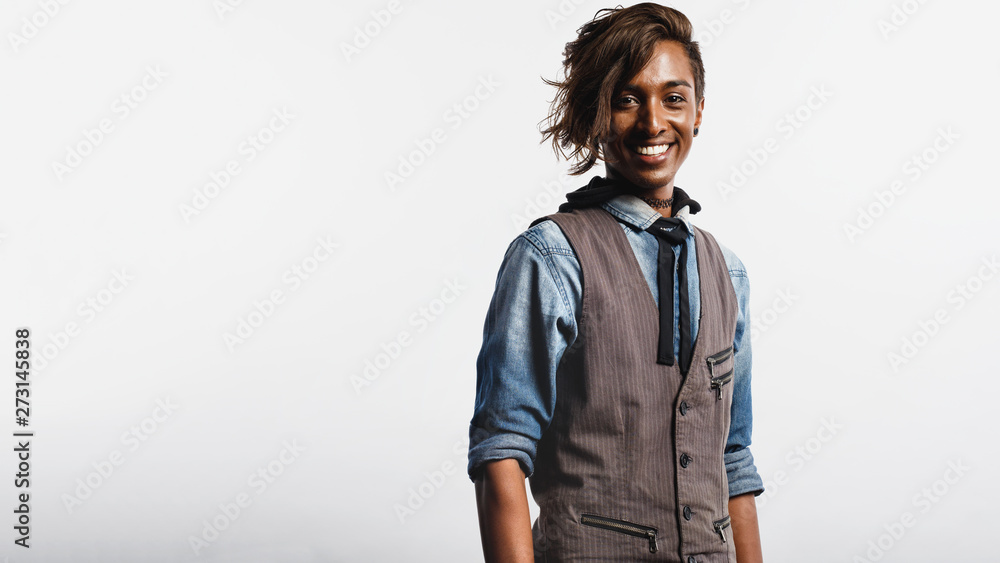 Fototapeta premium Smiling african man in fashionable hairstyle